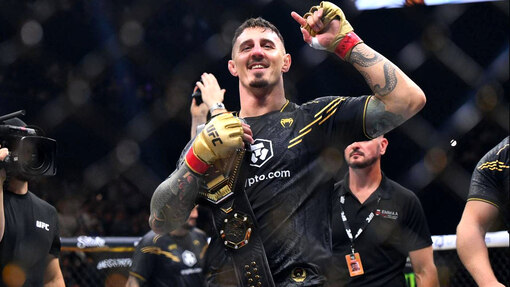 Том Аспиналл