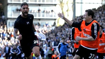 Ашкан Дежага (слева)