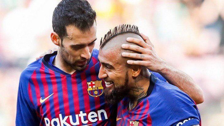 Артуро Видаль и Серхио Бускетс