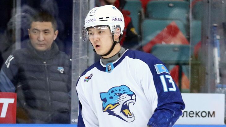 Динмухамедом Кайыржаном